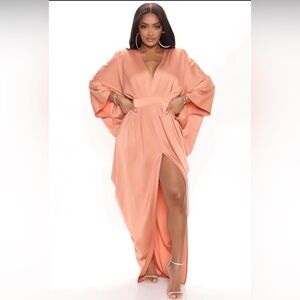 This dress runs small, fits more like a medium in the waist.